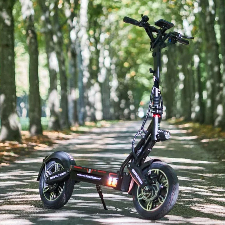 Dualtron City electric scooter on a tree-lined path