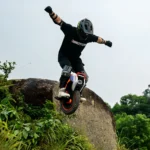 INMOTION V14 Pro rider descending an obstacle