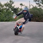 INMOTION V14 Pro rider carving on a closed riding area