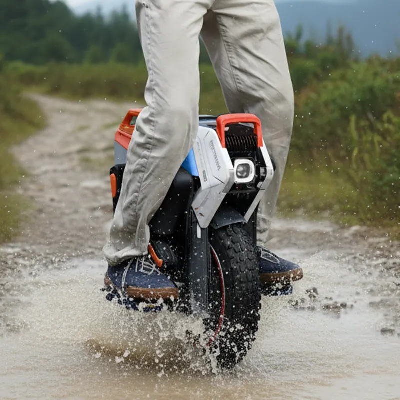 INMOTION V14 Pro riding through water and mud