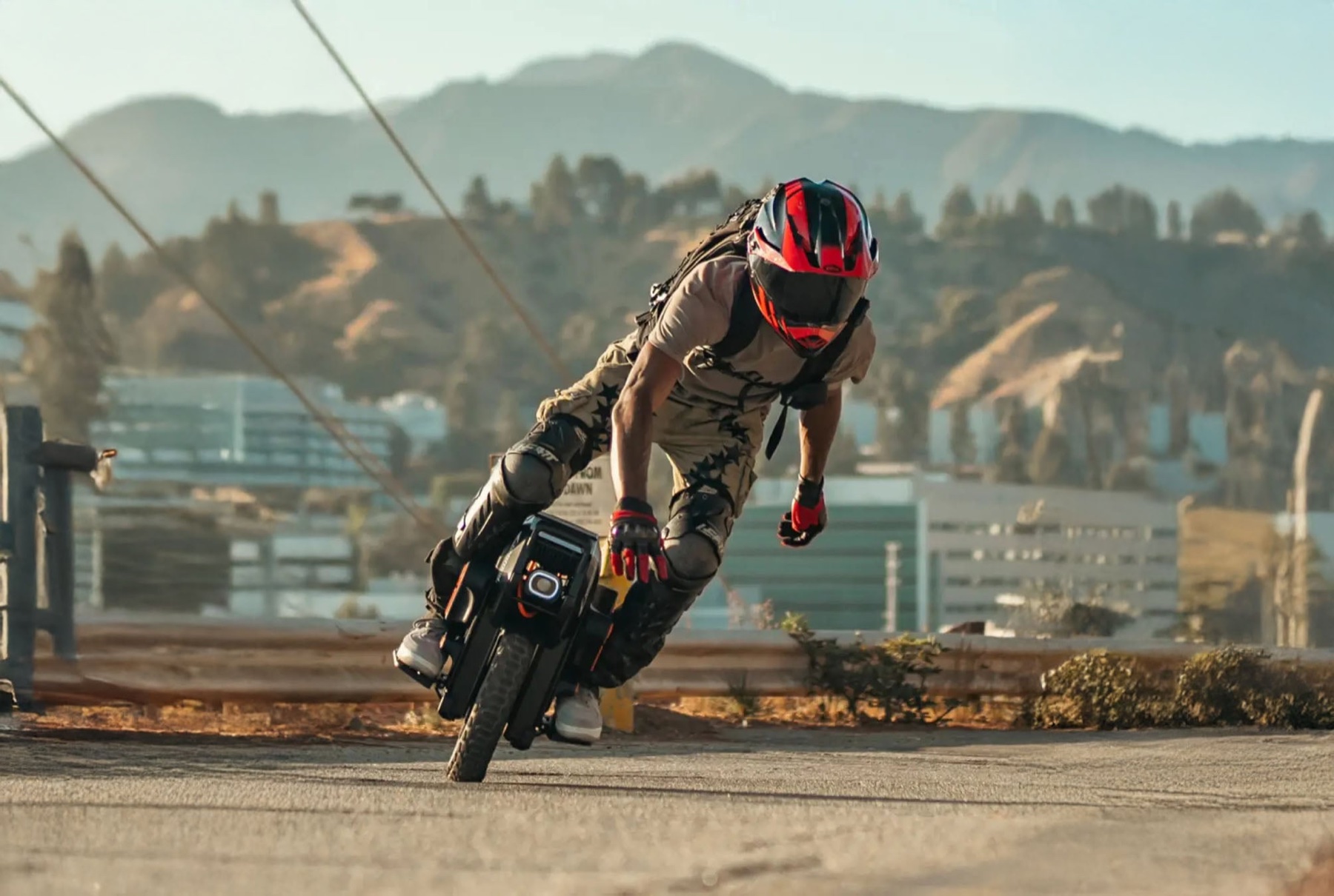 Rider leaning a LEAPERKIM ORYX 50S through a corner