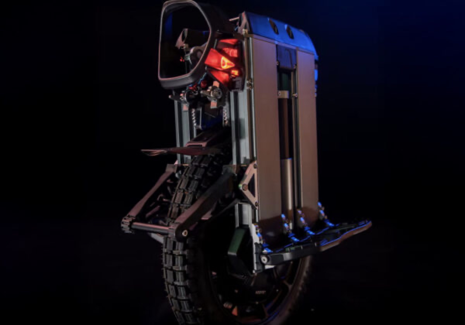 NOSFET APEX electric unicycle, front view in the dark