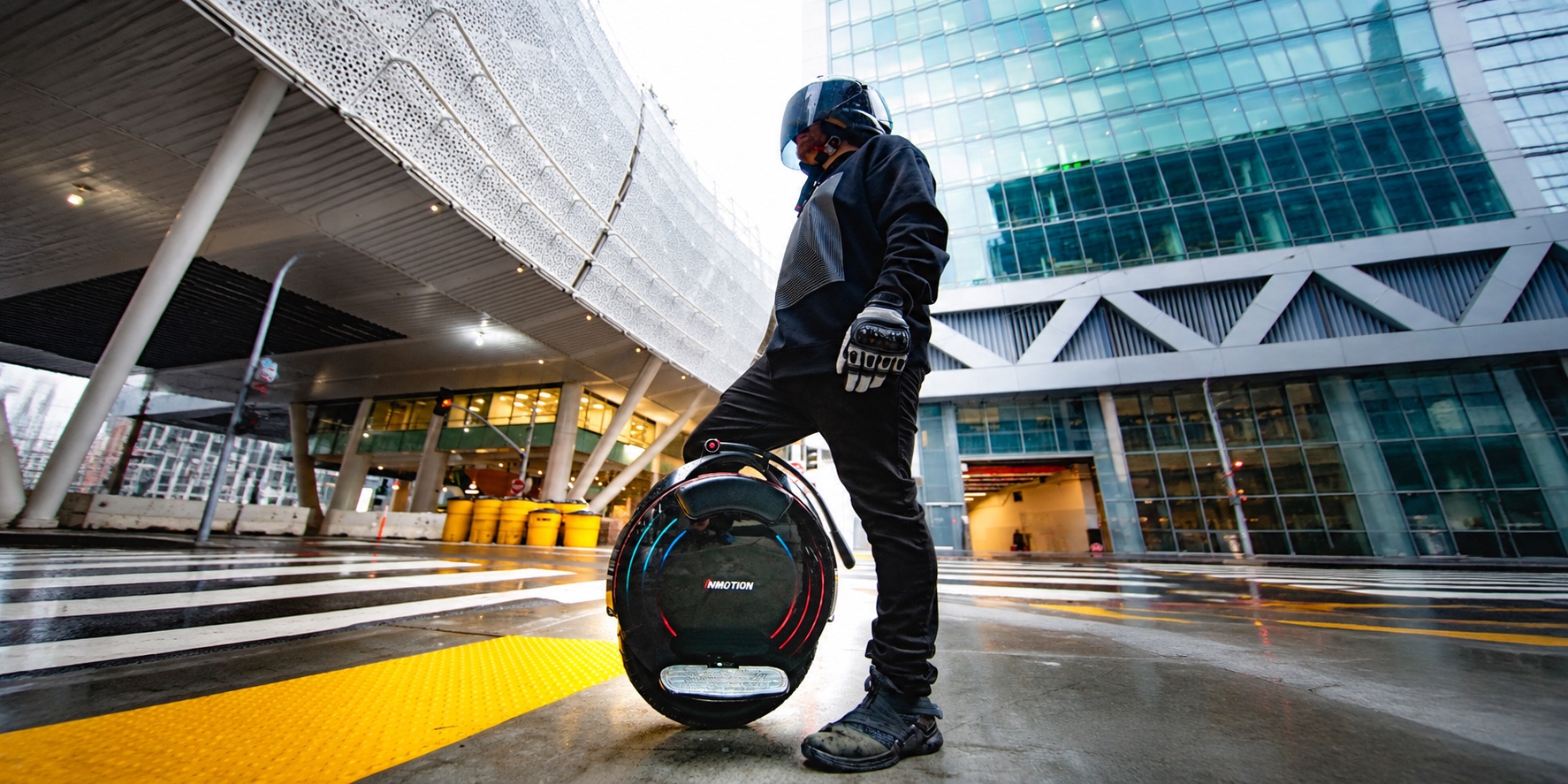 INMOTION V10F rider in an urban setting
